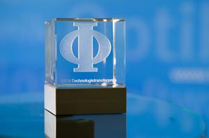 Square glass trophy with wooden base and the DPG logo.